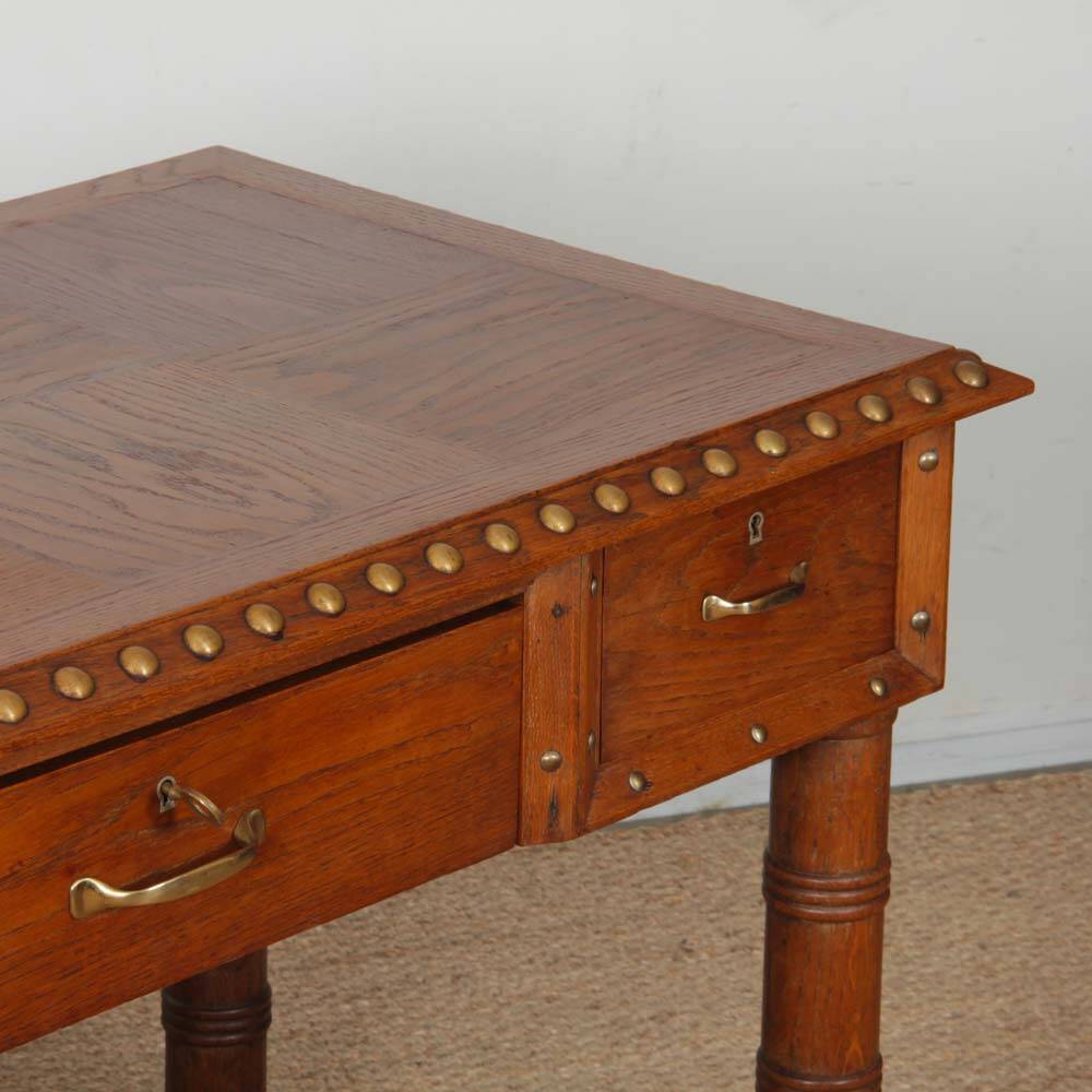 Oak and brass desk in the style of Charles Dudouyt, 1940.
