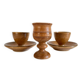 Trio of vintage ceramic and wood egg cups