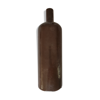 Bottle in varnished sandstone