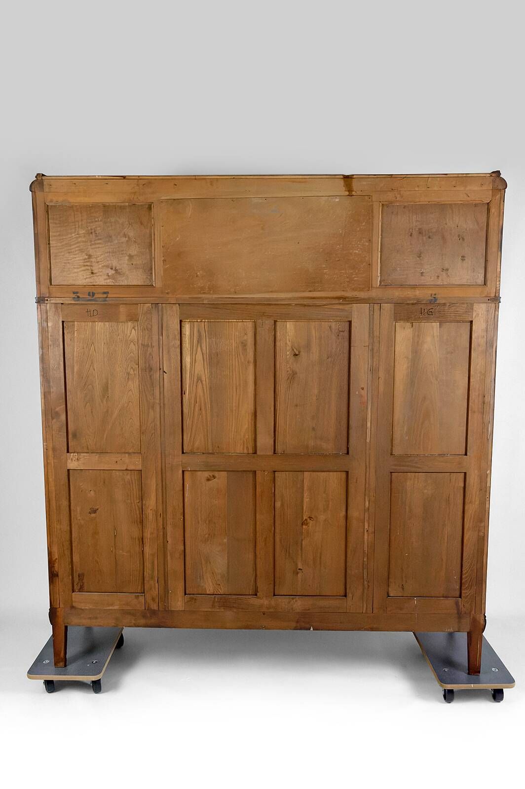 Art Deco showcase bookcase in carved walnut, France, circa 1925
