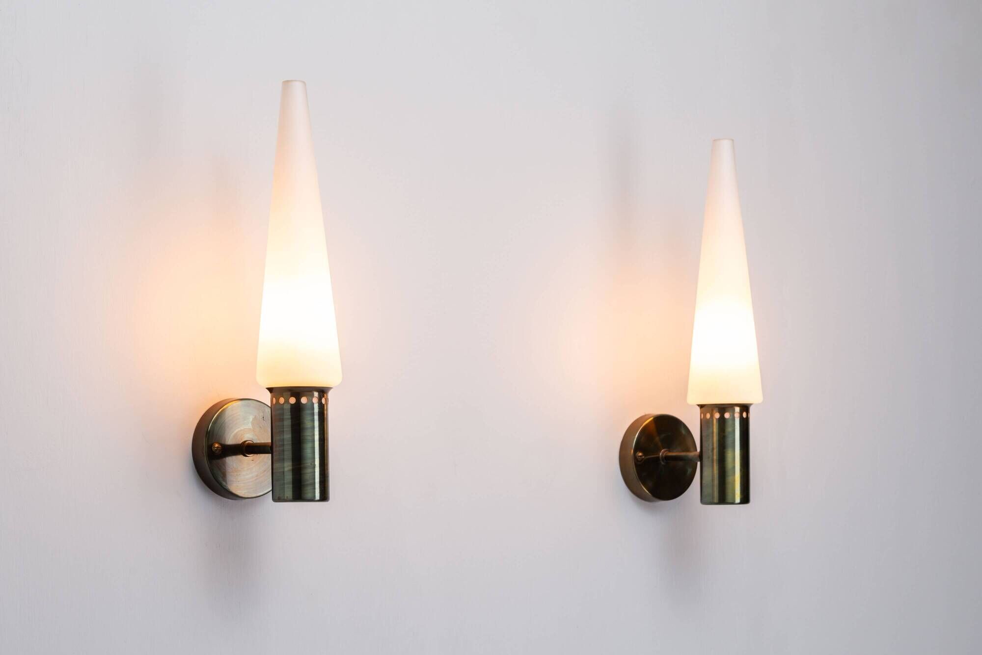 Set of two Hans Agne Jakobsson wall lamps with opal glass shades