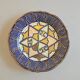 Decorative plate in glazed earthenware HB Quimper with ethnic patterns.