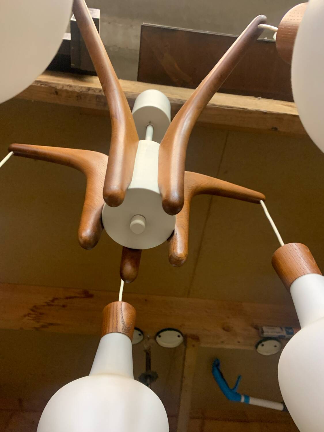 Teak and opaline Rispal chandelier, circa 1960.