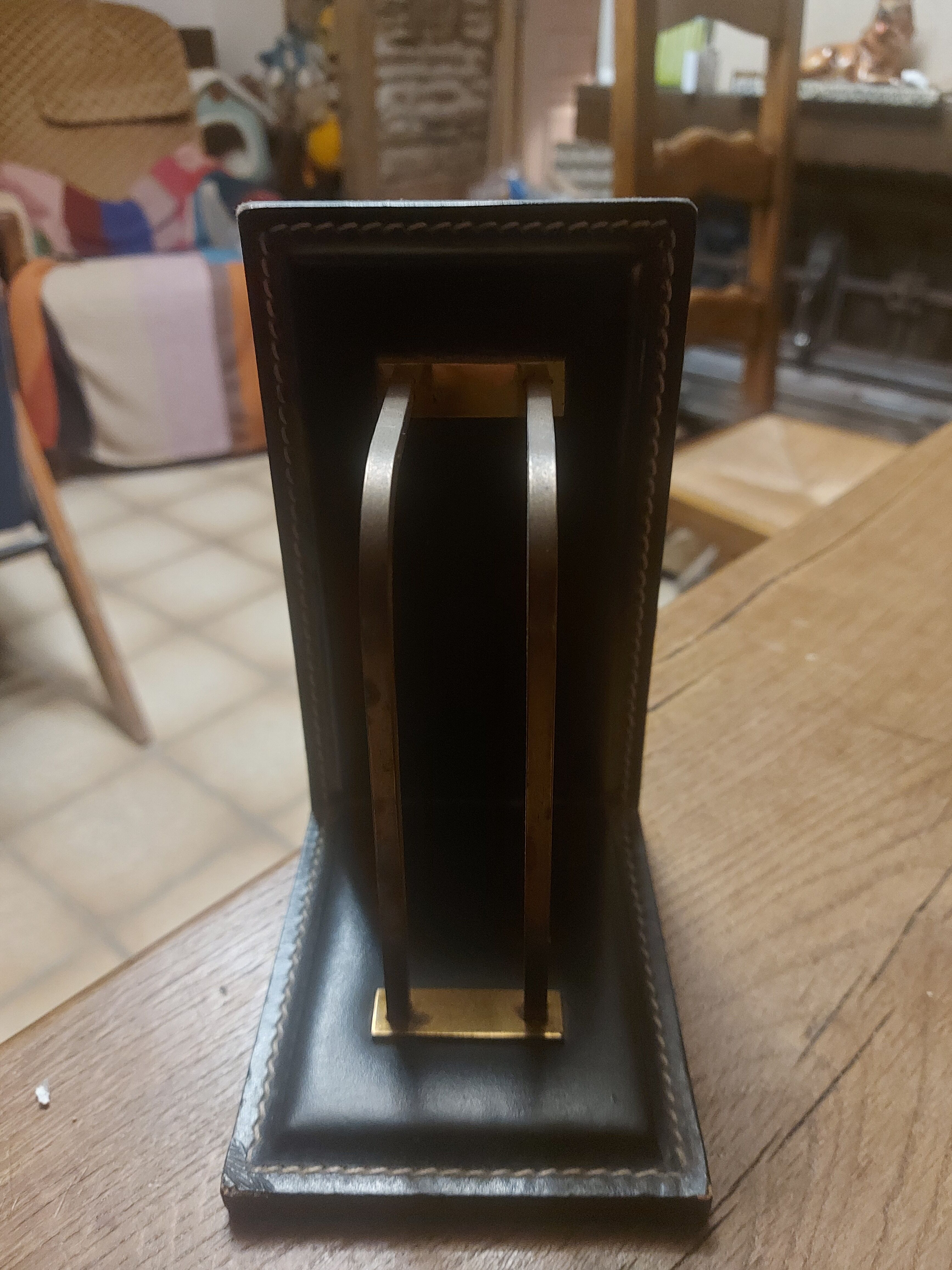 2 modernist leather bookends attributed to Jacques Adnet