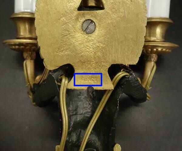 Pair of winged putti wall sconces in Louis XVI style - gilded bronze and black patina