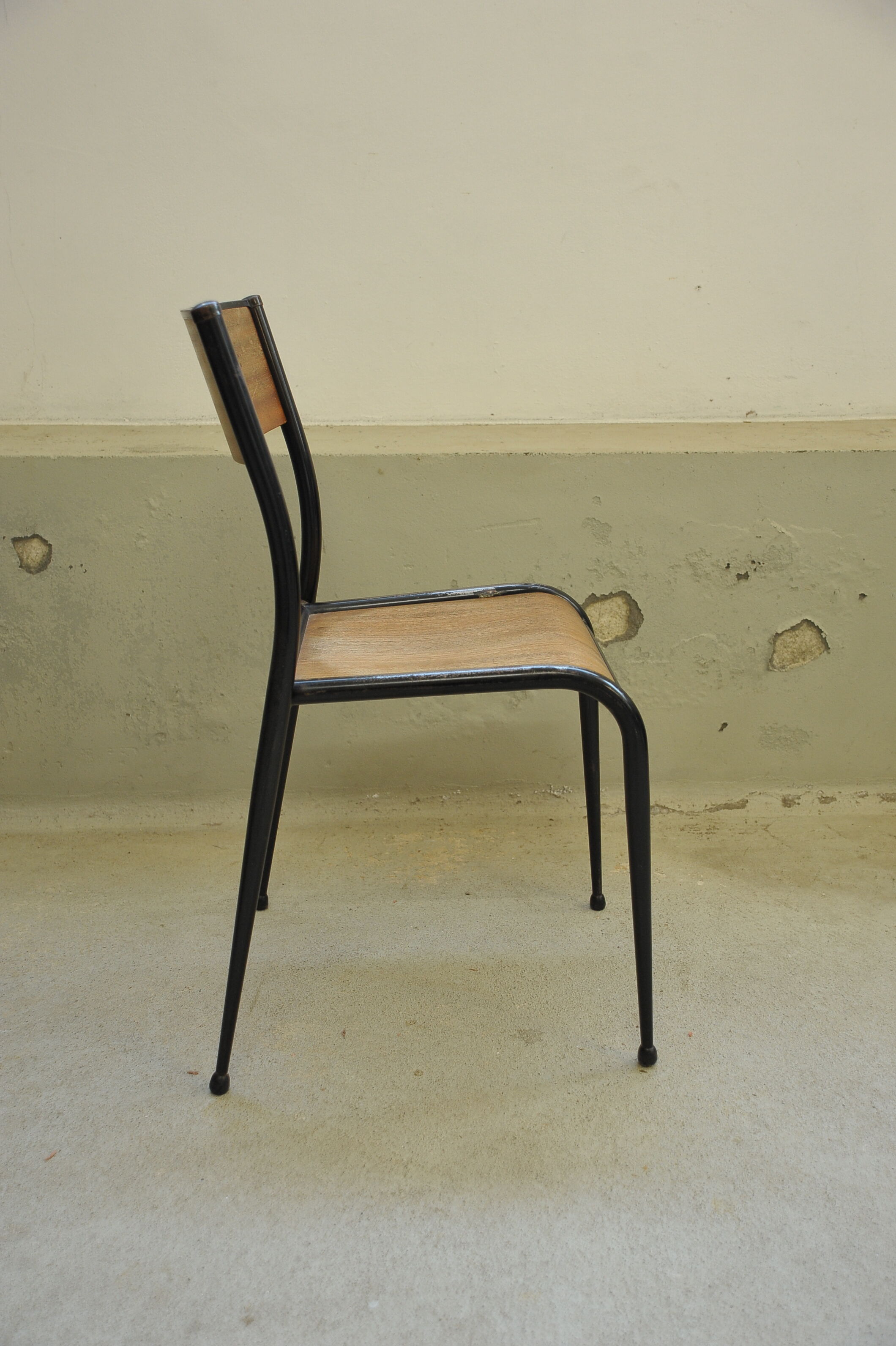 Series of 6 black Mullca school chairs