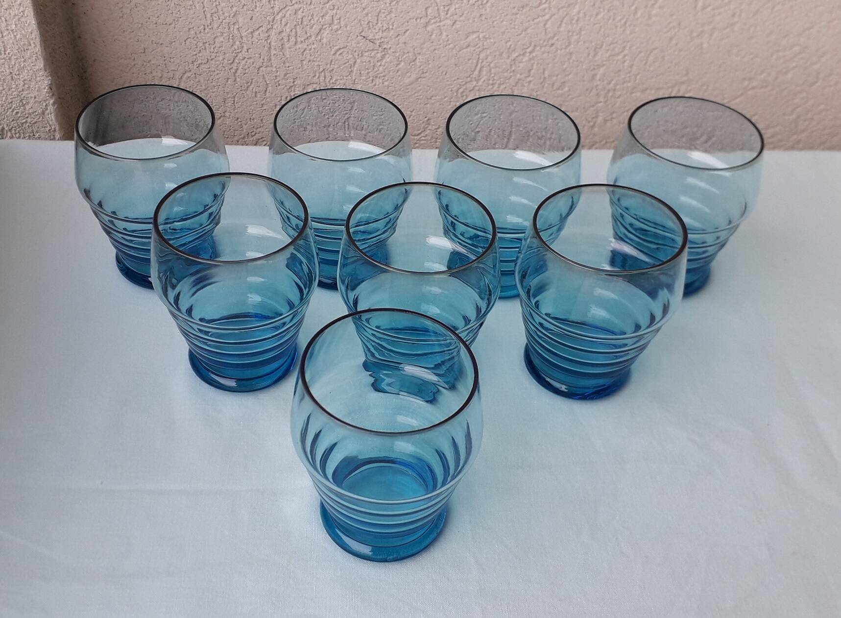 8 blue glasses