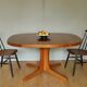 Walnut oval table with extension cords