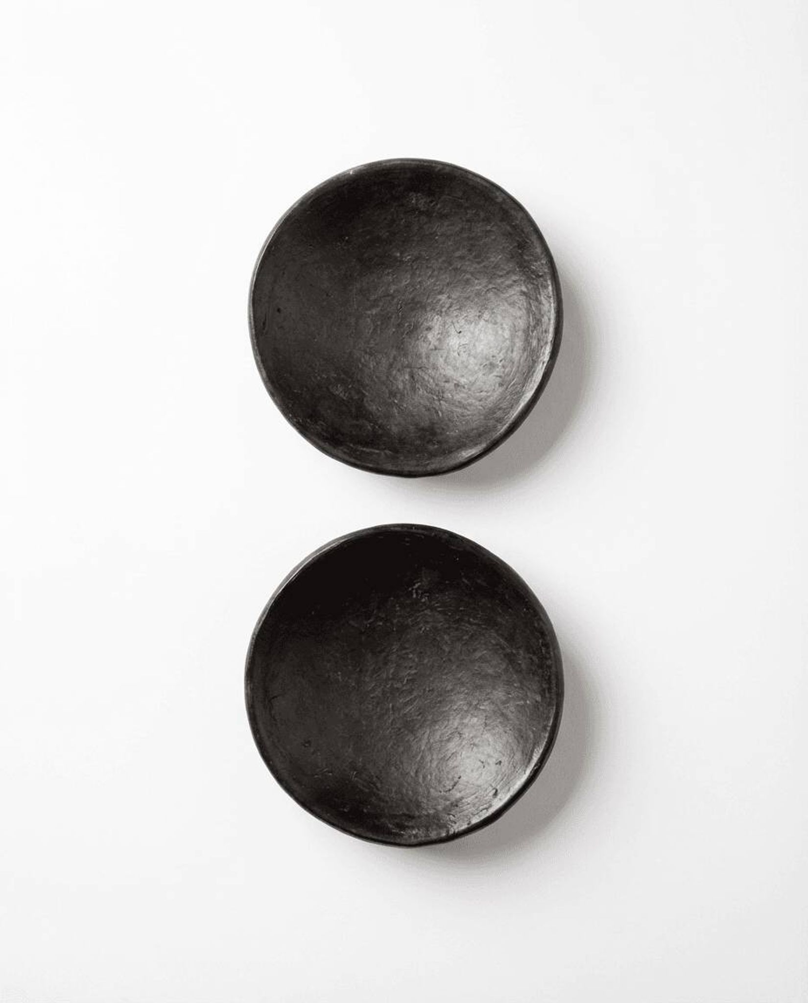 Two smoked terracotta bowls—for mezze, spices, or Kanah sauces.