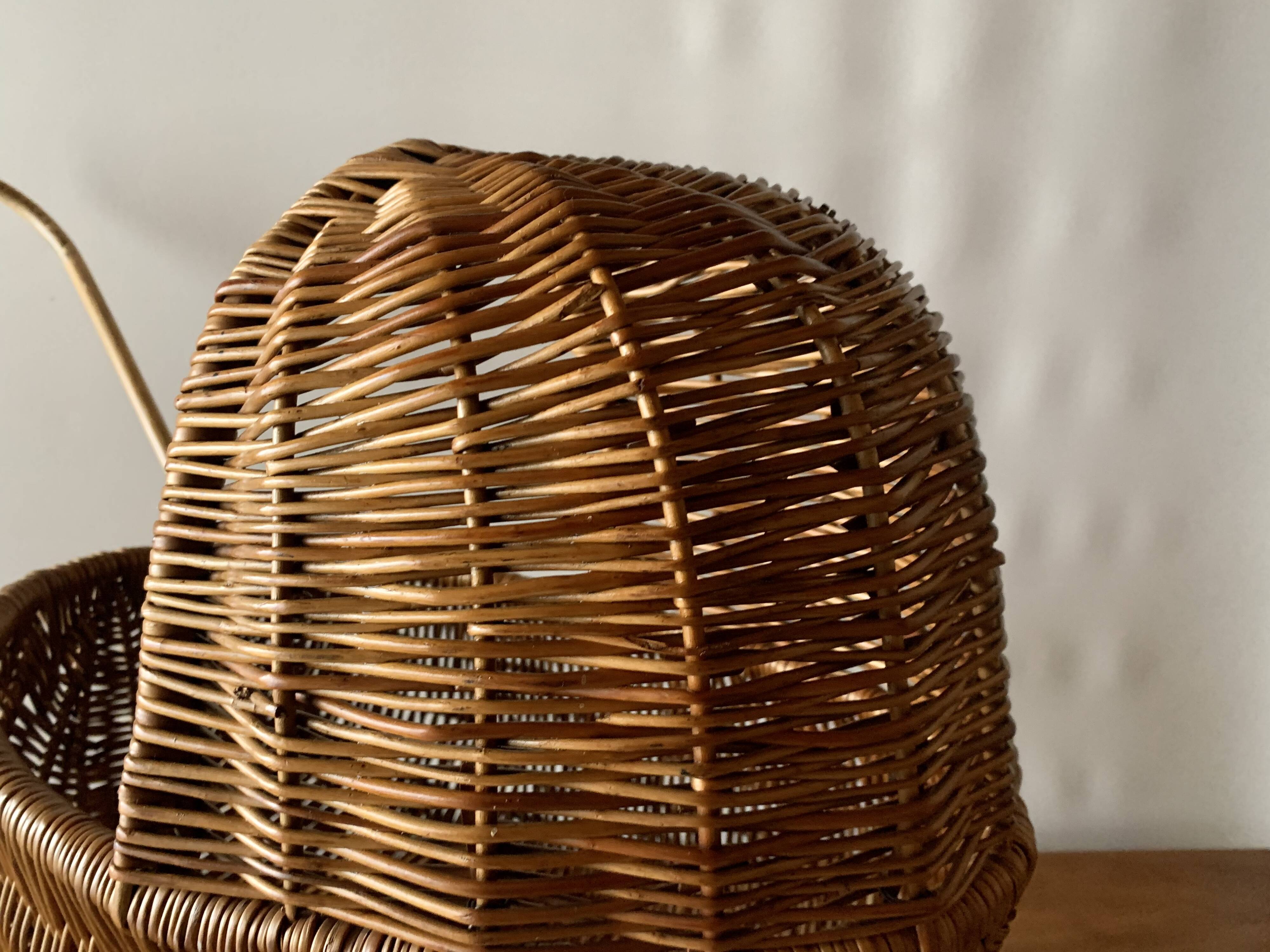 Old wicker dolls' pram - wooden wheels