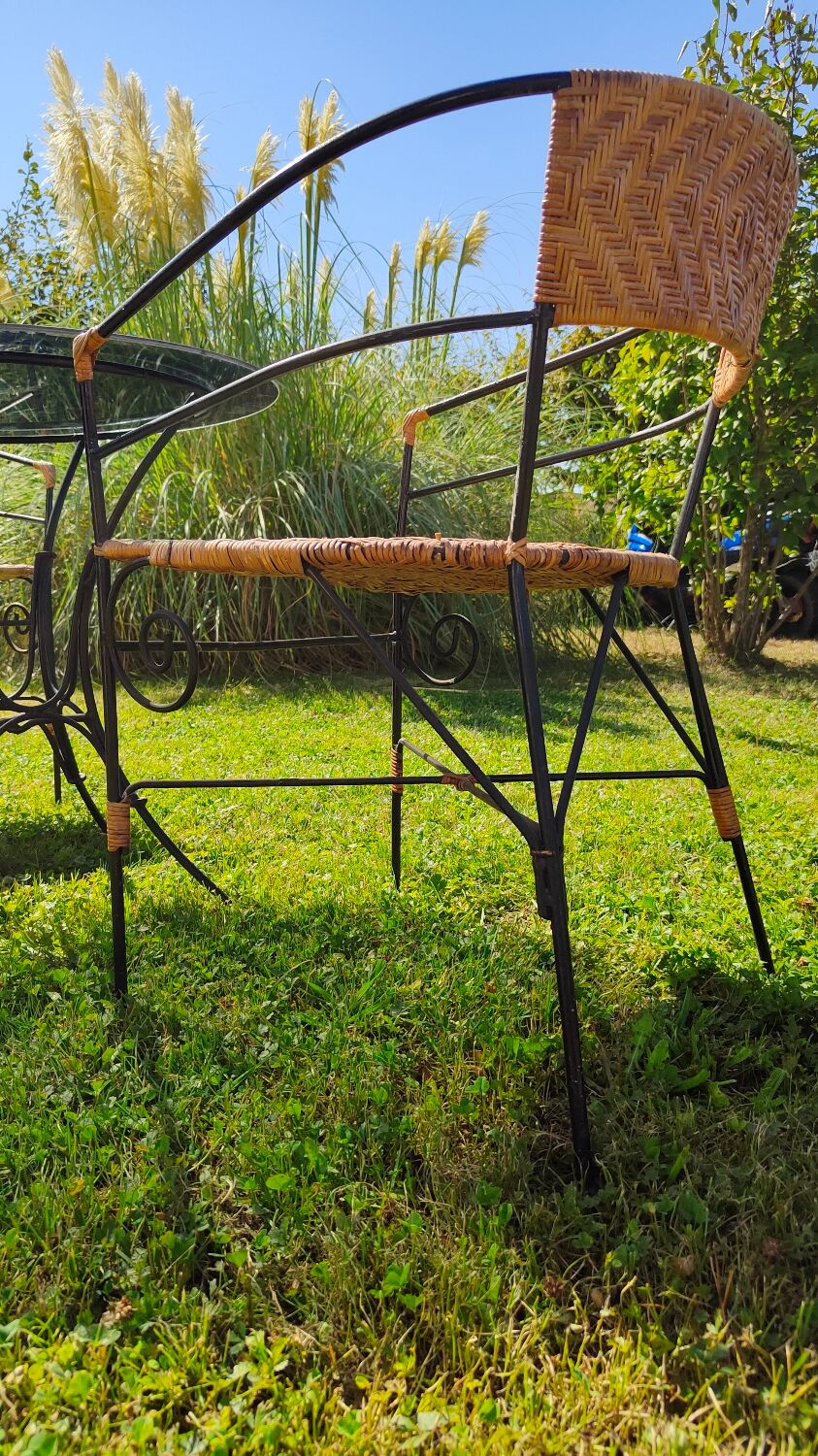 Garden table and wrought iron chair