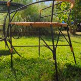Garden table and wrought iron chair
