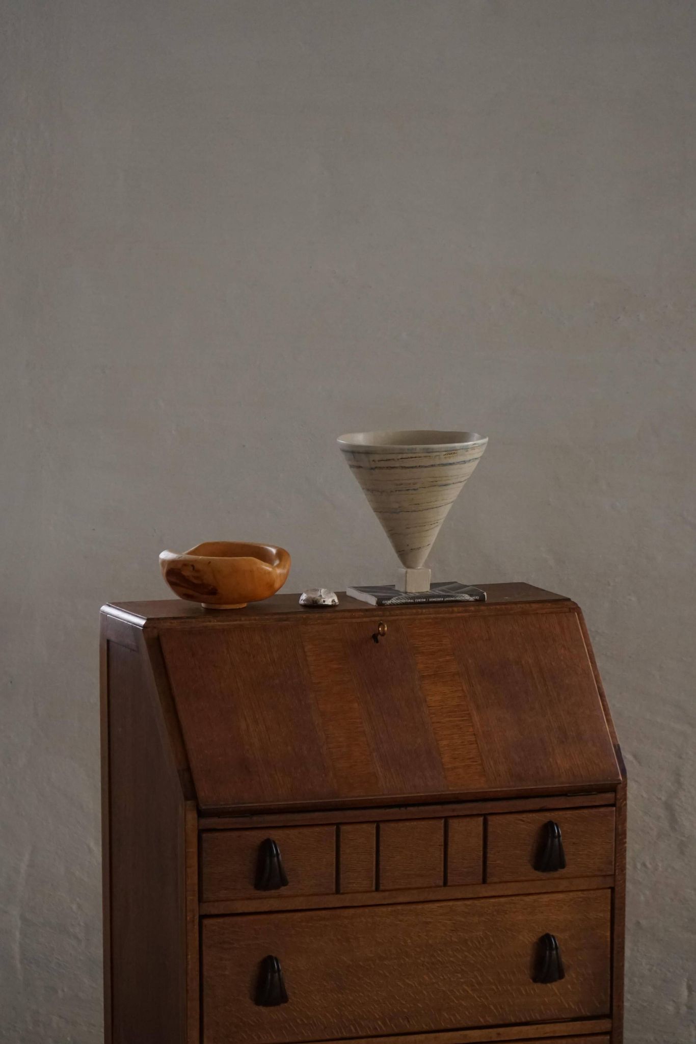 Desk / Chest of drawers in modern Danish oak from the early 20th century with shell handles.