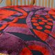Set of 4 subtle and charming vintage 60s rattan boho chairs with colorful upholstered seats
