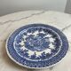 Set of four flat plates from English earthenware.
