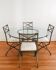 Pierre Vandel Paris – round glass table + 4 chairs, certificates