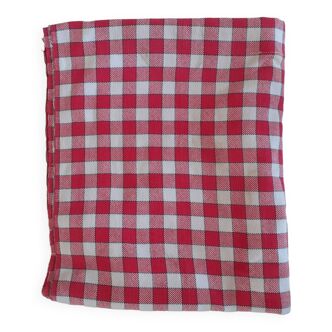 Old tablecloth with red and white checks. Made of thick cotton.