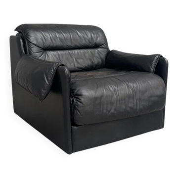 Black leather lounge chair by Dreipunkt, 1970s