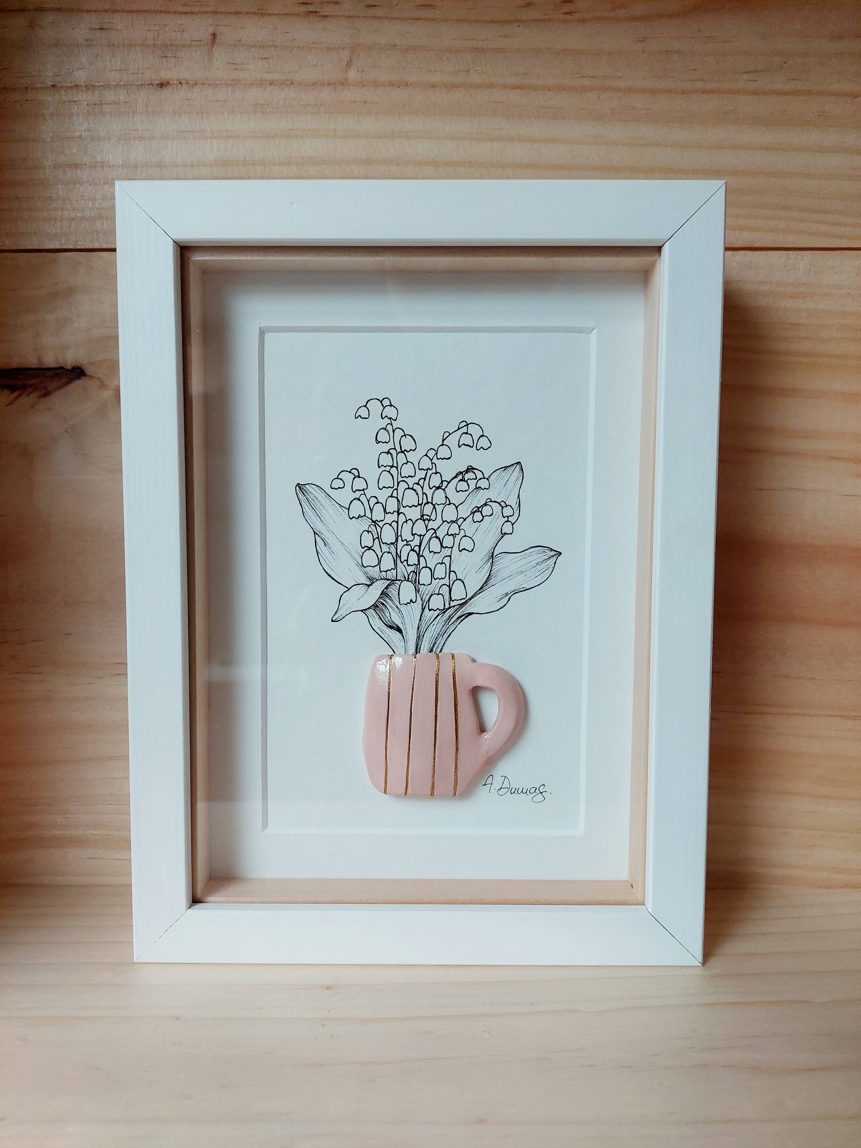Composition of a bouquet of lily of the valley in a clay mug