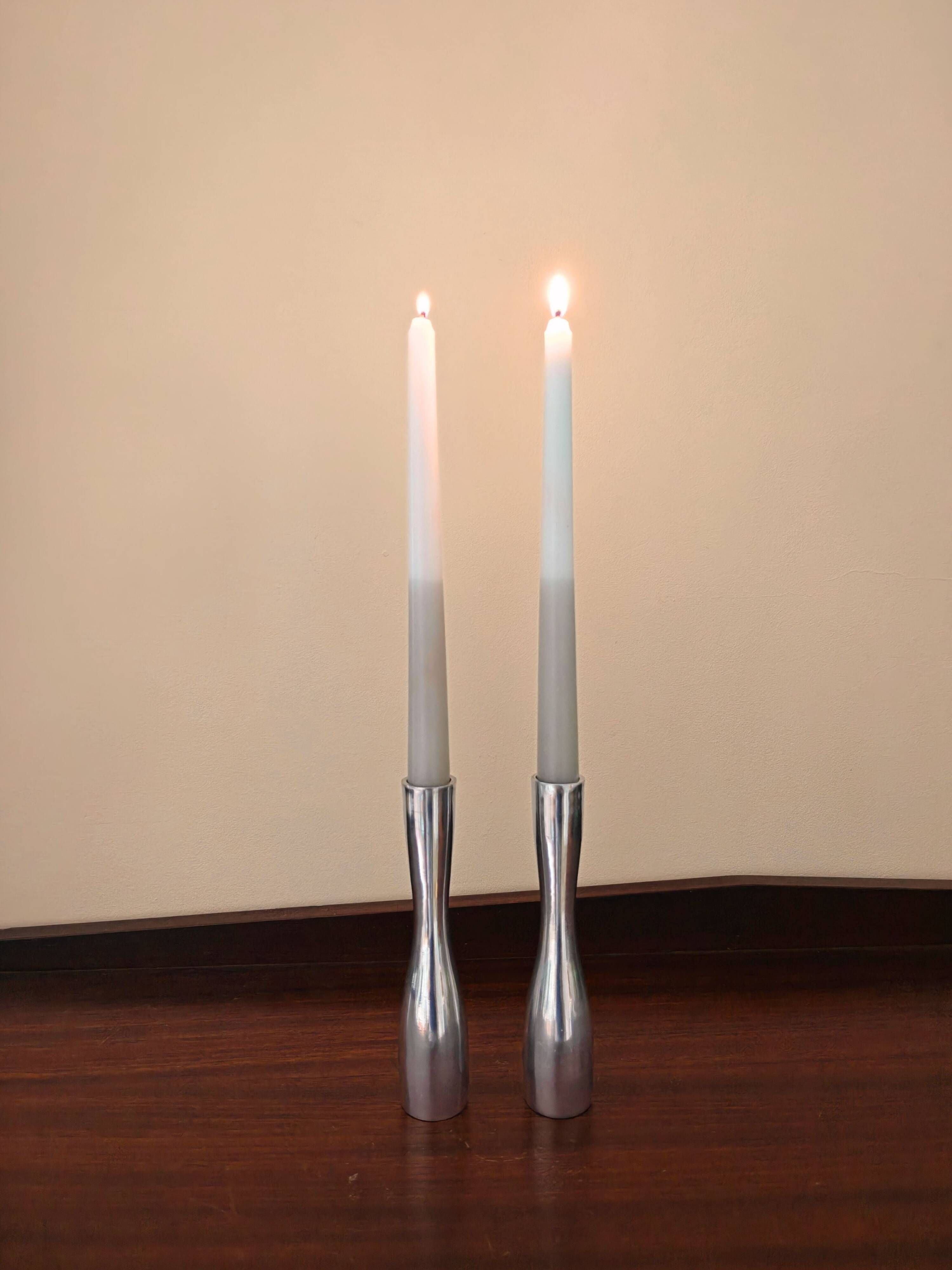 Pair of minimalist aluminium candlesticks in the style of Erika Pekkar.