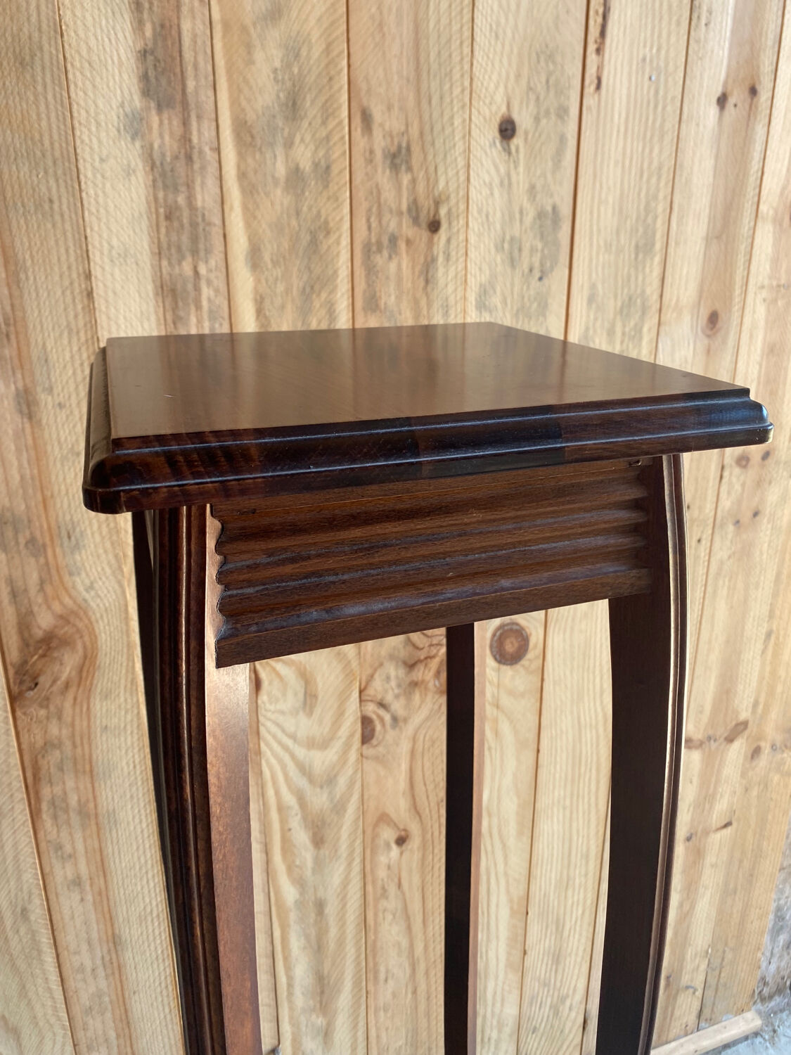 Wooden pedestal table