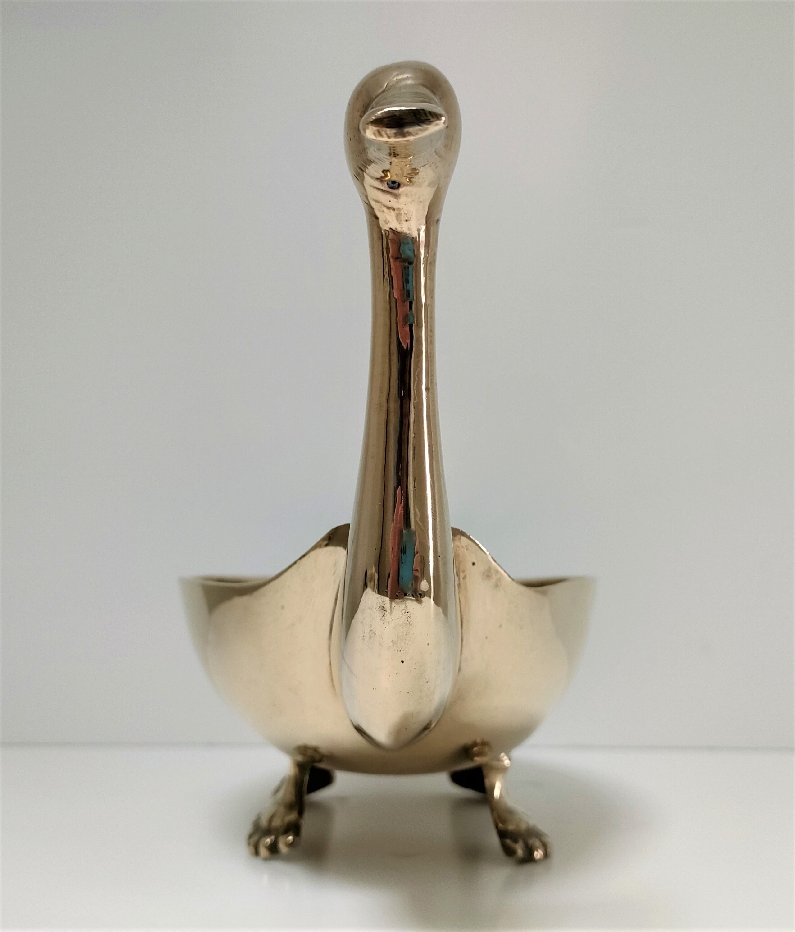 Zoomorphic cut brass bird 70s