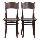 Ensemble de deux chaises de bistrot en bois vintage au design Cosmos intemporel.