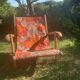 Vintage beach or garden chair made of wood and floral fabric, 1970s.