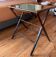 Folding mahogany table with a mirror top.