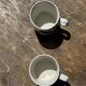 Pair of mugs with stylized Italian women motifs