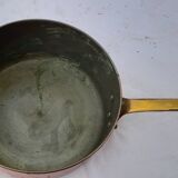 Lots of tinned copper kitchen utensils