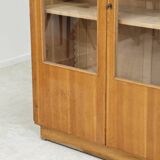 Oak glass-fronted school cabinet 1960