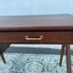 Bureau moderniste en bois à pieds compas 1950