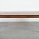 Antique French farmhouse table with two drawers and an extendable leaf.