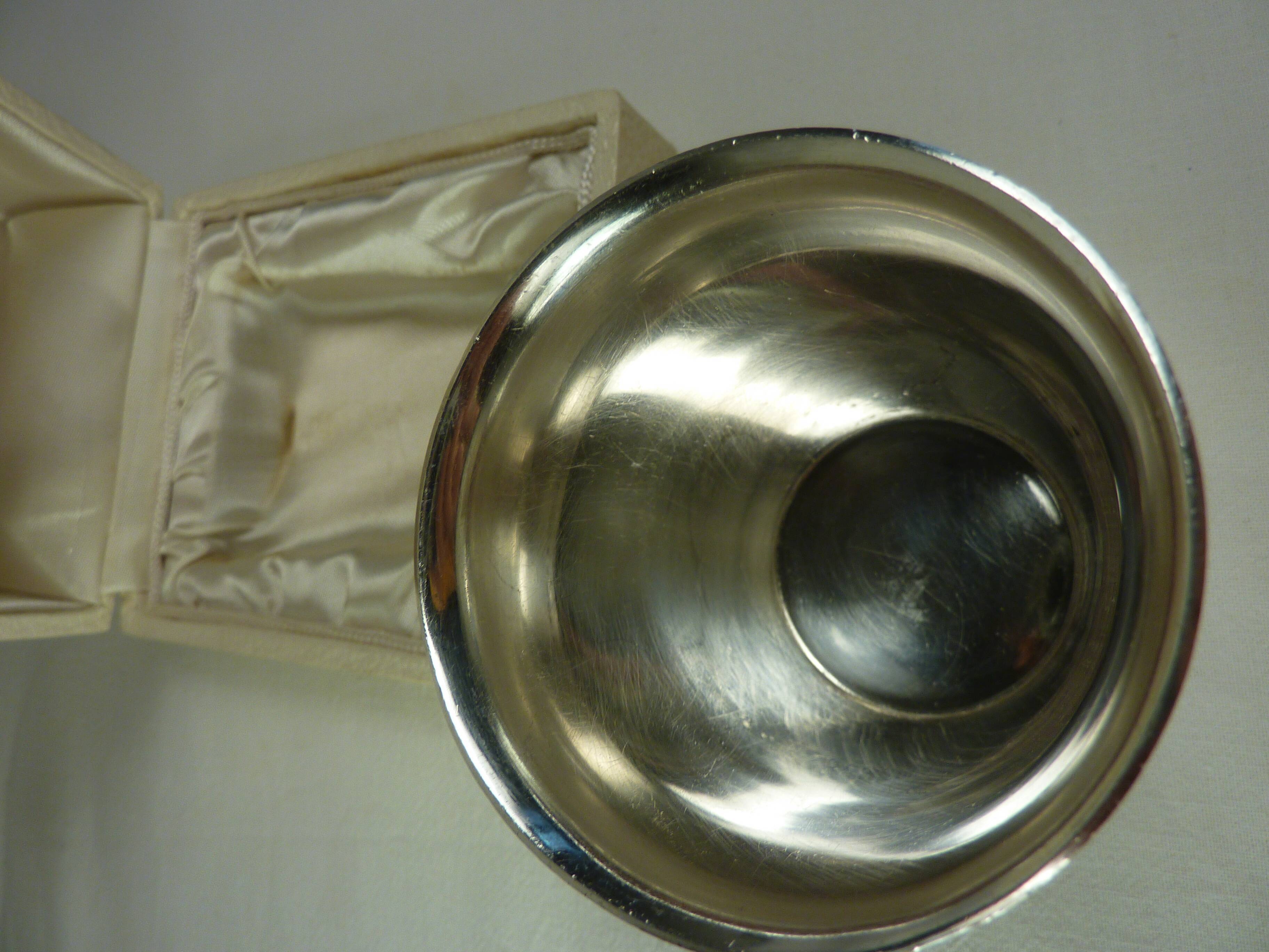 Silver metal timpani in its original case