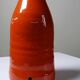 Bright orange mid-century decorative bottle lamp base glazed pottery.