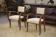 Pair of bridge armchairs in walnut and cream boucle fabric, early 20th century.
