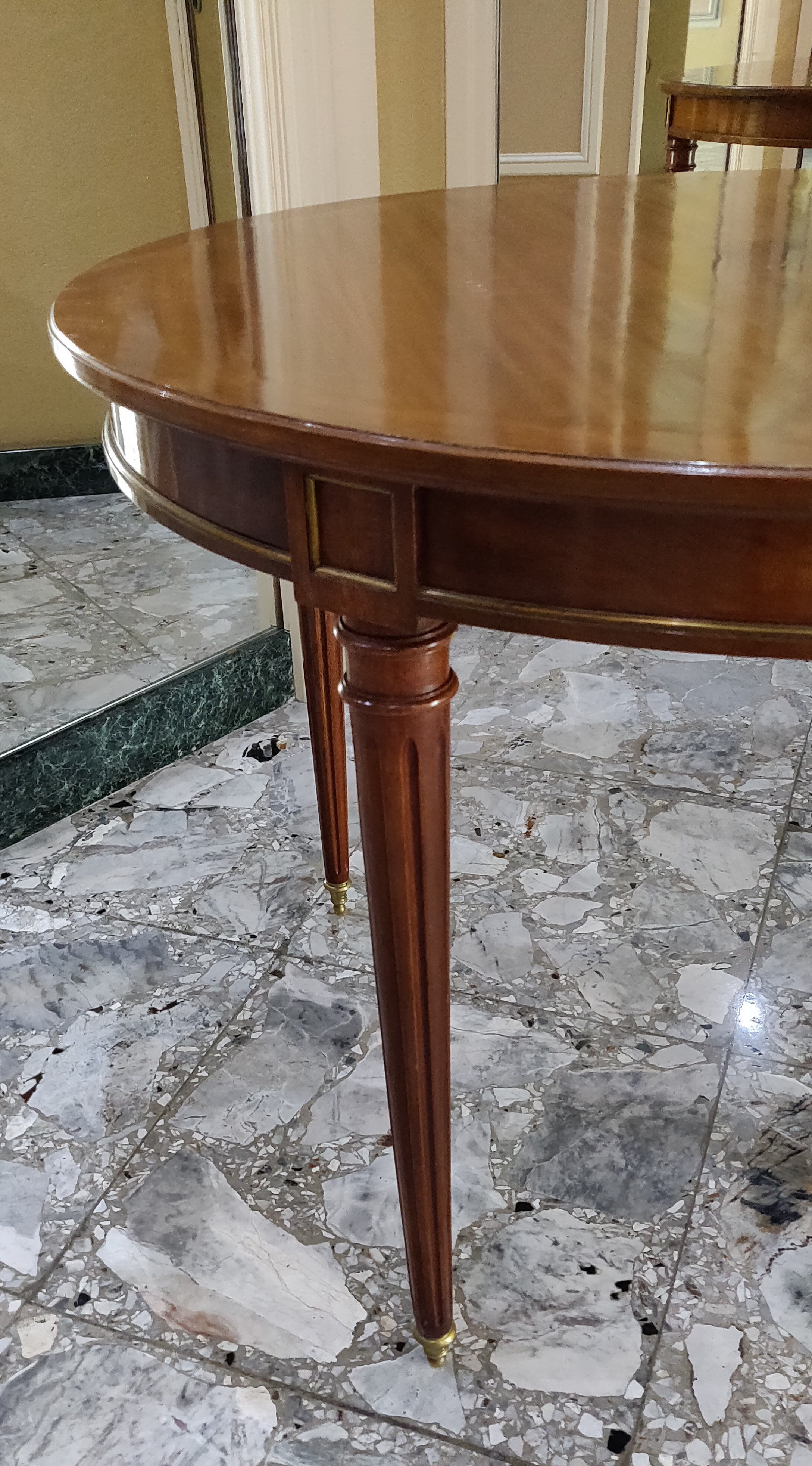 Louis XVI dining table in cherry and bronze