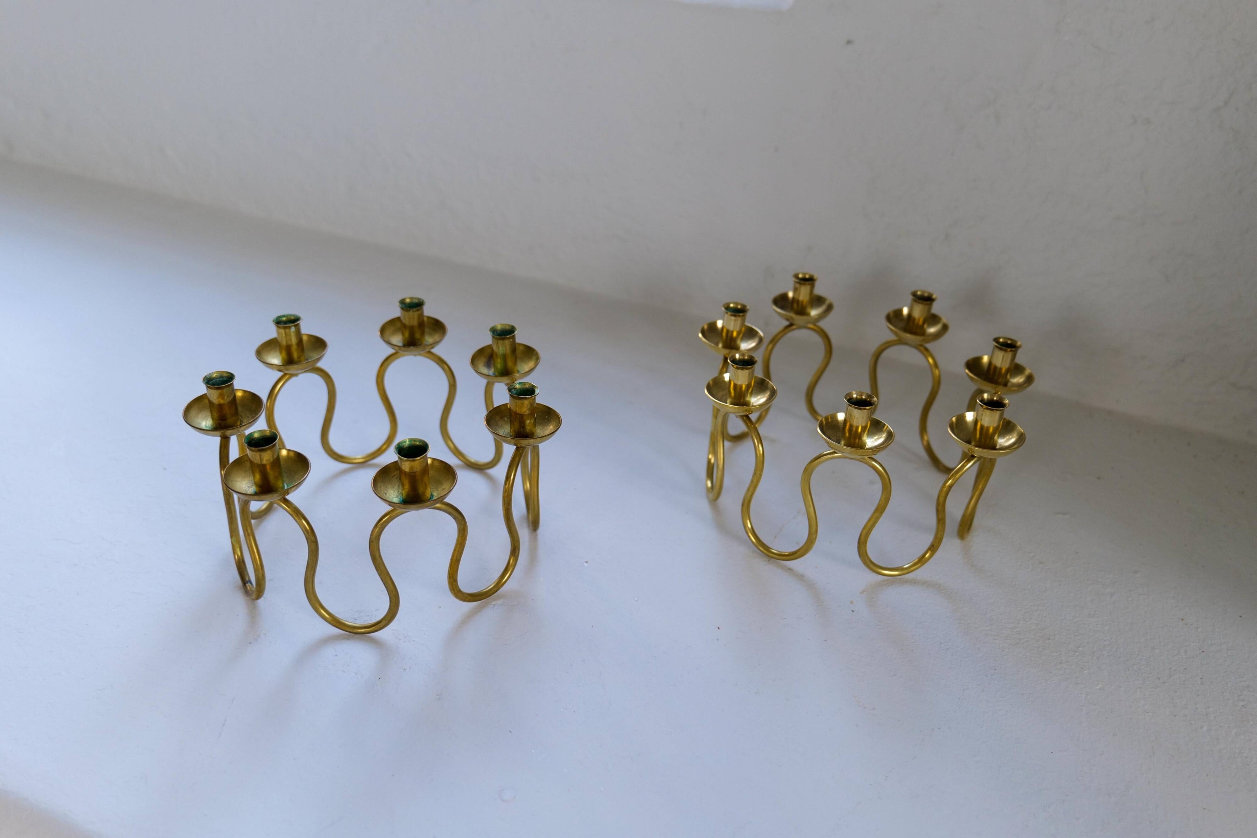 Art Deco brass chandeliers by Lars Holmström in Arvika, Sweden.