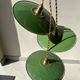 Trio of vintage green enamelled sheet metal lampshade pendants