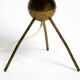 Mid Century tripod brass table lamp with a wrapped nylon strip lampshade