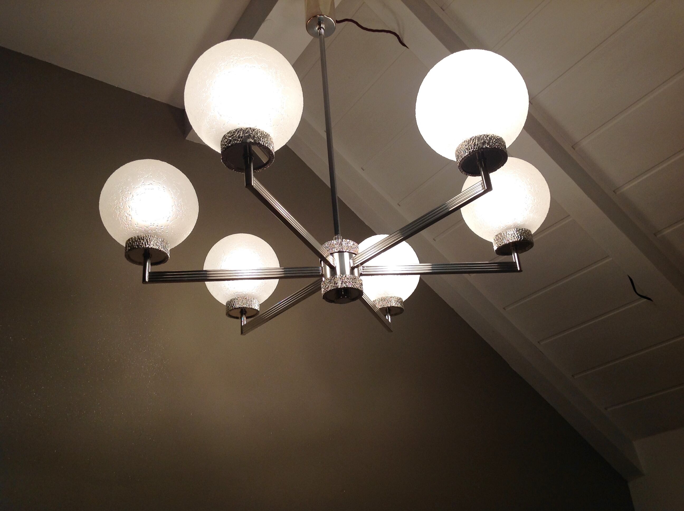 Six-light chrome metal chandelier and opaque glass globes / vintage 60s and 70s