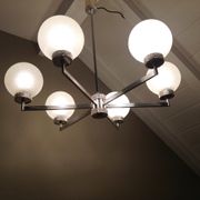 Six-light chrome metal chandelier and opaque glass globes / vintage 60s and 70s
