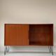 Vintage wooden sideboard with sliding door