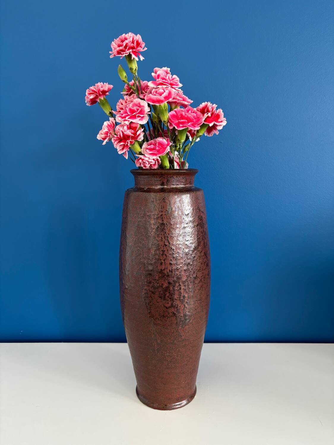 Large textured dark ceramic vase