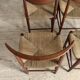 Danish vintage chairs in teak and cord by Peter Hvidt
