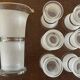 Jug + 6 frosted glass tumblers with white and gold rim.