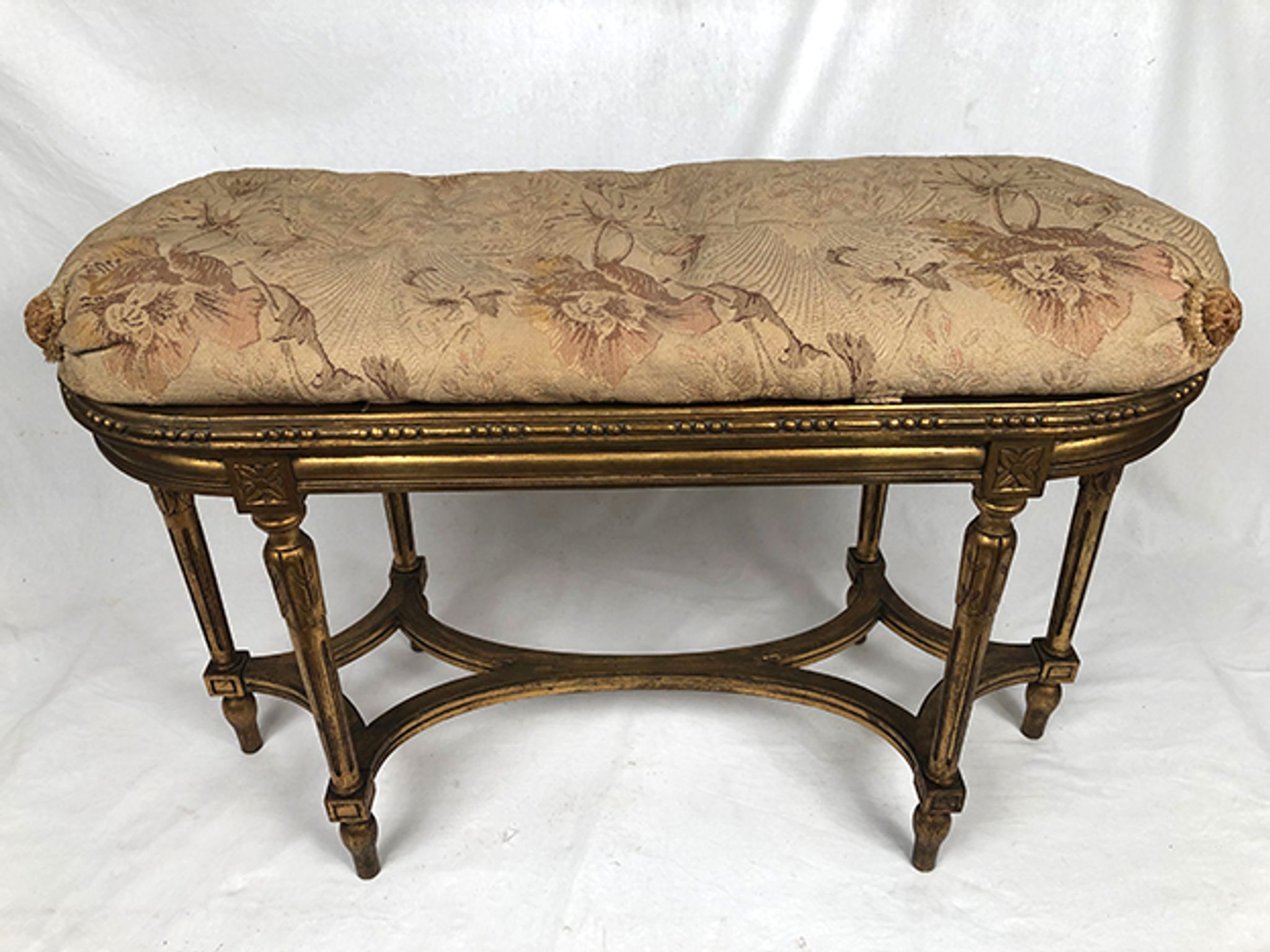 Banquette de piano de style Louis XVI bois doré foncé de canne