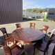 Round teak table 150 cm with 6 Indonesian chairs.