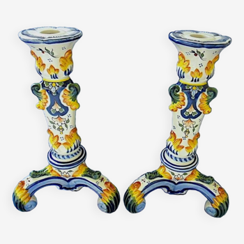 Pair of tripod candlesticks in polychrome glazed earthenware